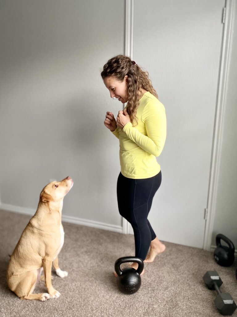 Coach Kristin tries talking to her dog, Rey.